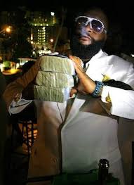 Rick Ross with money