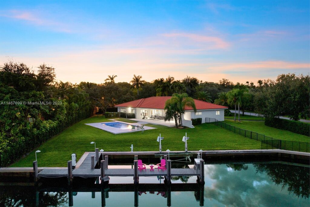 Private dock in backyard of waterfront home